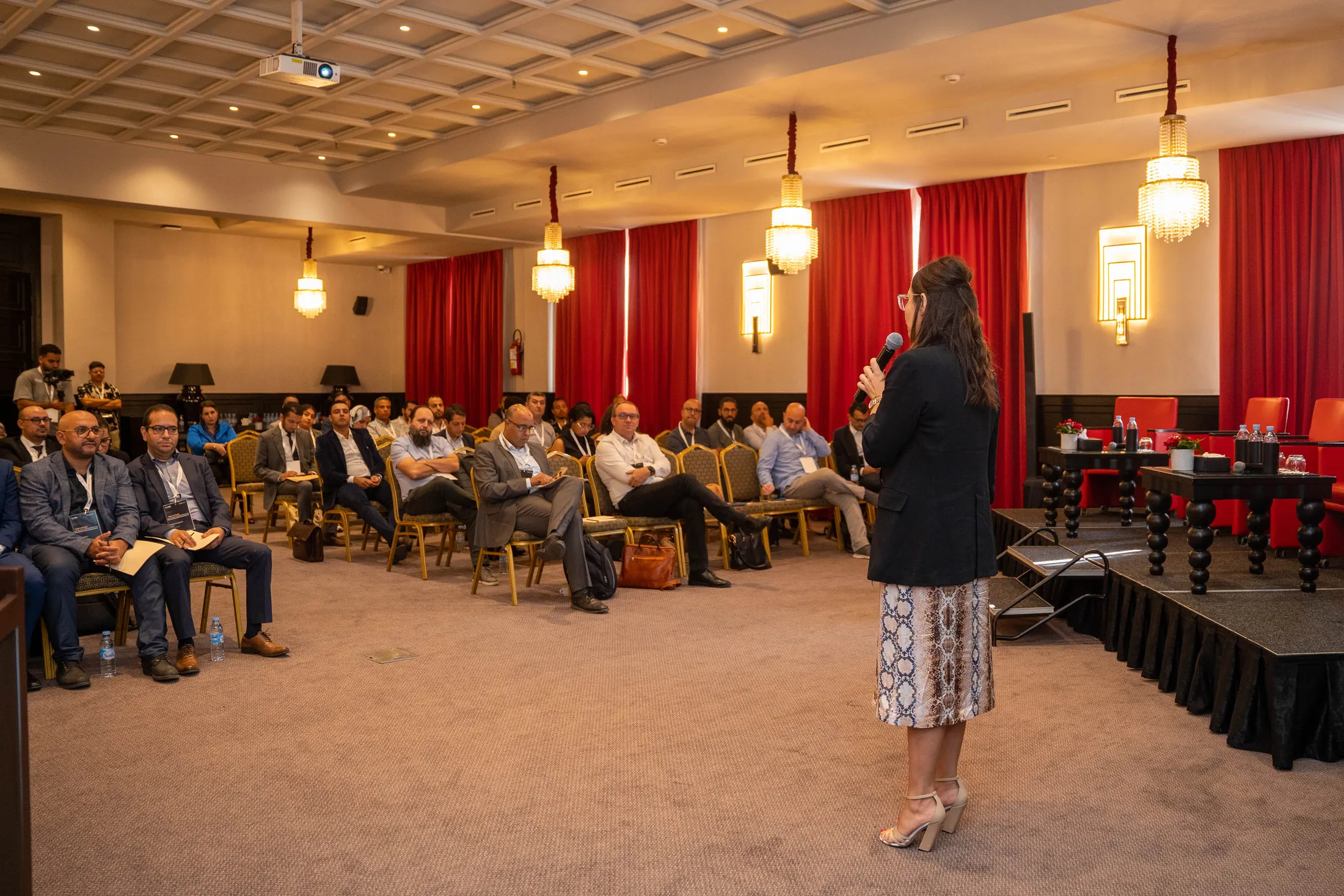 Wide view of the conference room during a talk