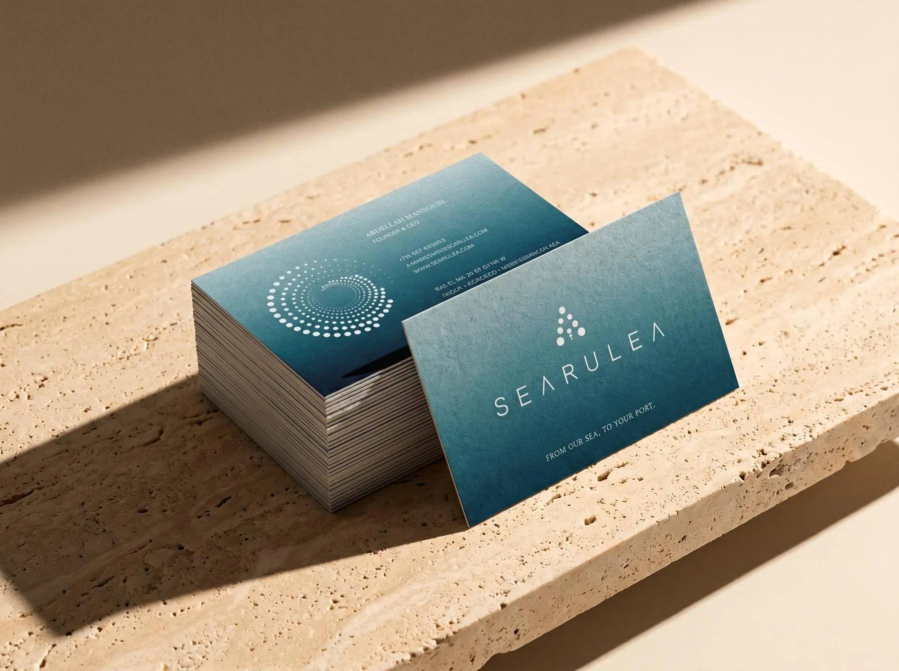 Searulea business cards on travertine, part of the identity system